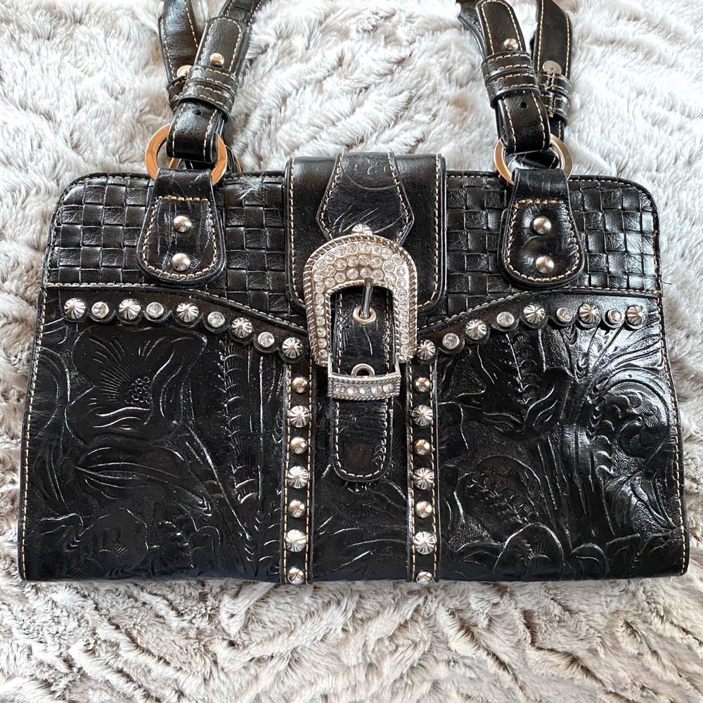 MC stamped leather handbag